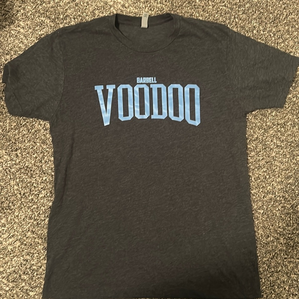Size large barbell voodoo tee shirt. Never worn.
